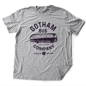 This GIF shows a model wearing a retro t-shirt inspired by The Honeymooners, a 1950s Classic tv show featuring Jackie Gleason as Ralph Kramden. This shirt is a fictional promotion of the show’s Gotham Bus Company and shows a graphic of an old bus. By fashion brand VNTG, available from wolfsaint.net