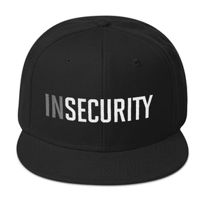 A classic black SnapBack cap with the sarcastic typographic play on words. It reads INSECURITY, instead of SECURITY, as an ironic, self-deprecating meme style visual pun. By fashion brand YUF, from wolfsaint.net