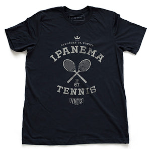 Vintage-inspired, retro graphic sports t-shirt in classic Navy Blue and Parchment, as a ‘team’ shirt for a fictitious tennis team championship in Ipanema, Rio de Janeiro, Brazil. By fashion brand VNTG., from wolfsaint.net