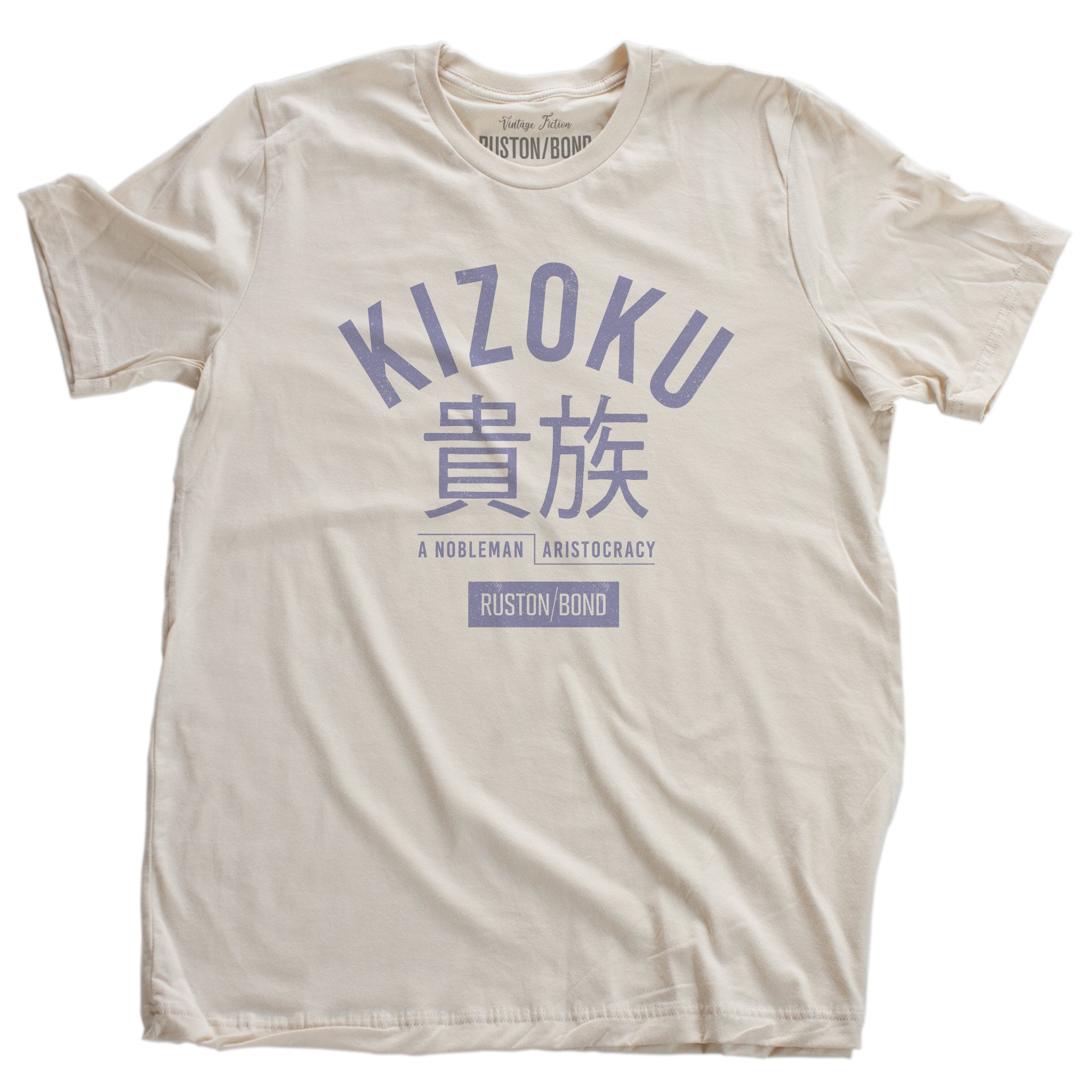 A retro fashion t-shirt in Soft Cream with the bold typographic of the Japanese word “KIZOKU” and “a nobleman / aristocracy” below the Japanese characters. By the fashion brand Ruston/Bond, from wolfsaint.net. 