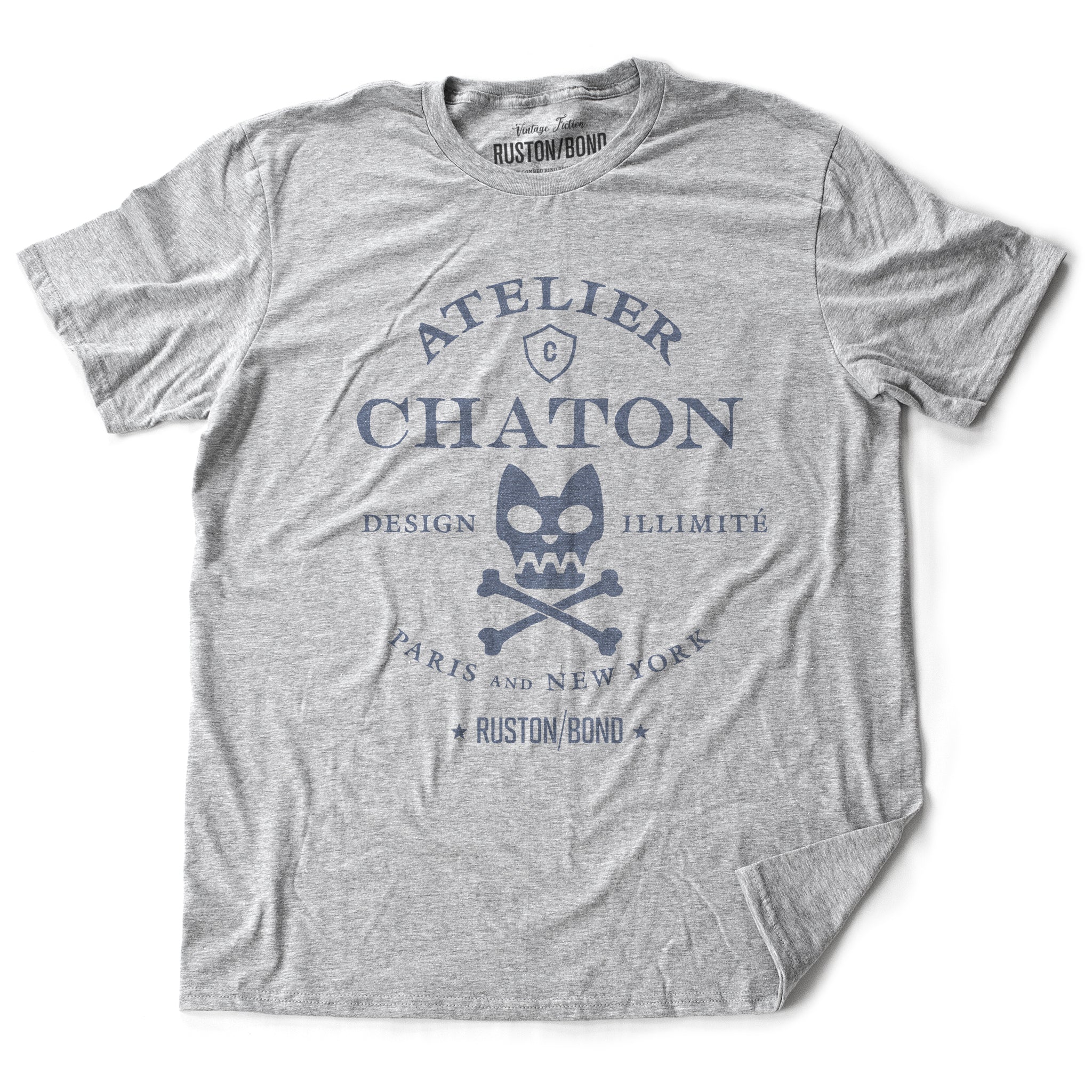 Athletic Gray retro, vintage-inspired fashion t-shirt for a fictional graphic design studio in Paris and New York, featuring a graphic of a cat skull and cross bones, from brand Ruston/Bond. From wolfsaint.net
