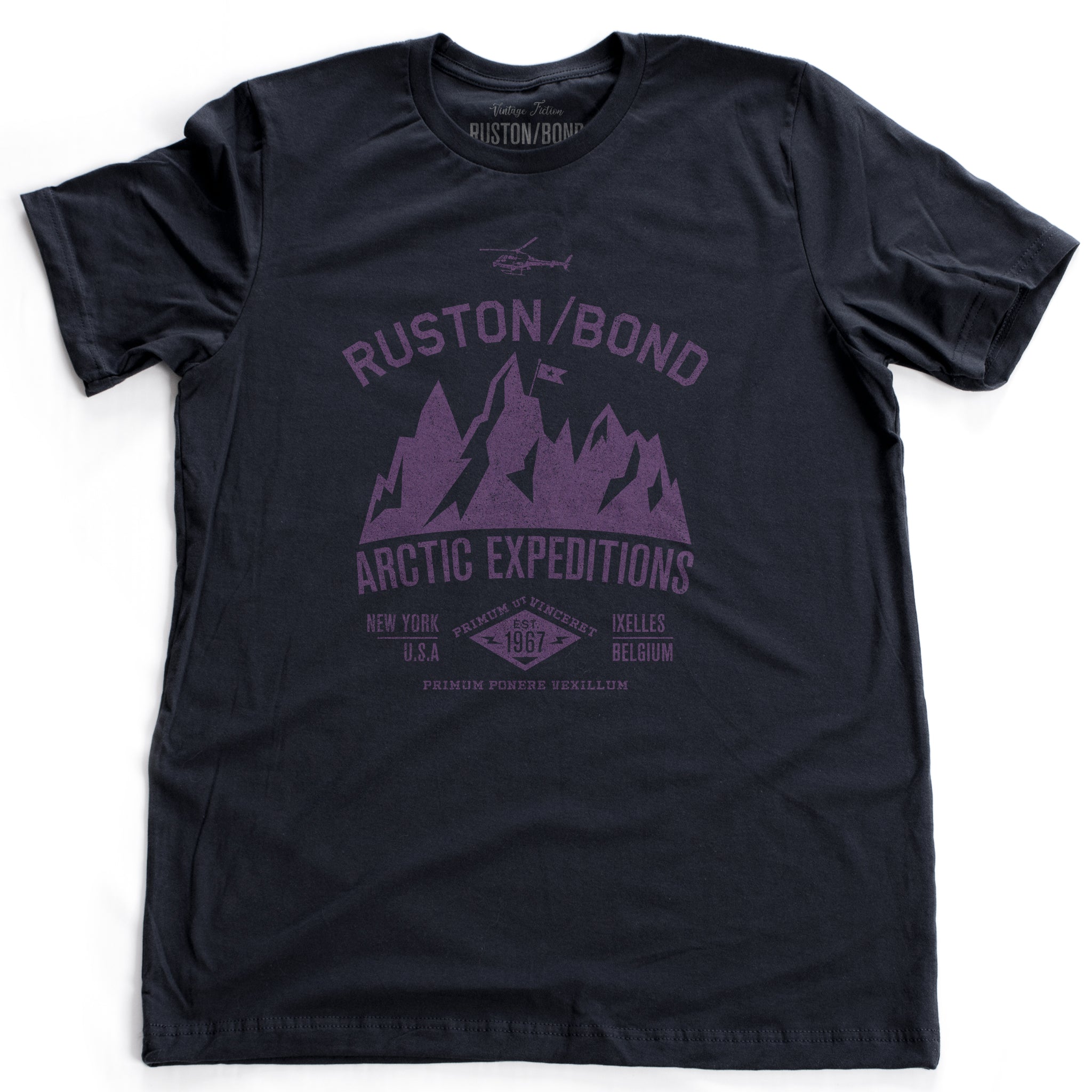 Navy Blue  classic, fashion, retro inspired t-shirt, with a fictional advertisement for an adventure company called Ruston/Bond Arctic Expeditions. It shows a mountain range and a helicopter, and lists the company locations in New York City and Ixelles, Belgium, and a Latin quote.  Inspired by the films of Wes Anderson. From wolfsaint.net