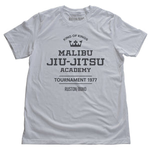 A fashionable, vintage-inspired retro t-shirt in White, featuring a graphic commemorating a sarcastic and fictitious Malibu (California) Jiu Jitsu academy and a 1977 tournament. By fashion brand Ruston/Bond, from wolfsaint.net