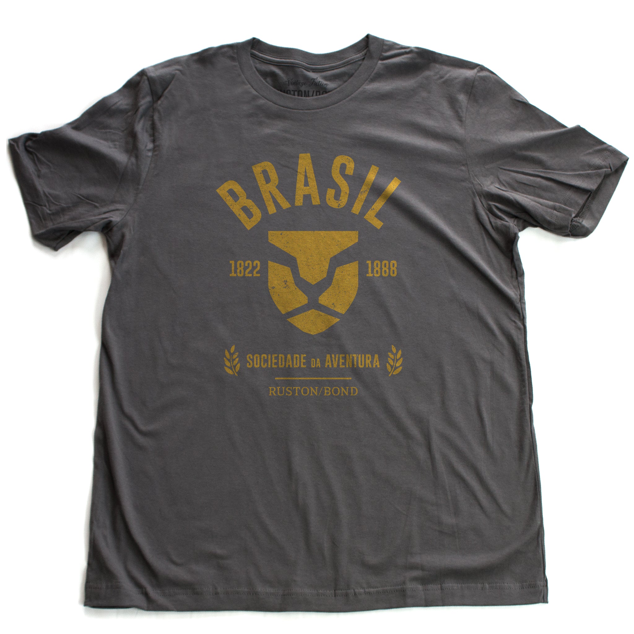 Asphalt gray fashion, retro-inspired t-shirt featuring classic graphic of a strong, minimalist Lion head, for a fictional adventure society in Brazil / Brasil from 1822 to 1888, by the brand Ruston/Bond. From wolfsaint.net