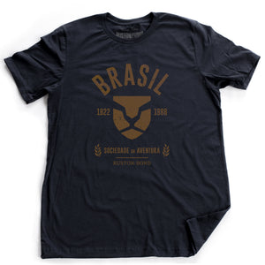 Navy blue fashion, retro-inspired t-shirt featuring classic graphic of a strong, minimalist Lion head, for a fictional adventure society in Brazil / Brasil from 1822 to 1888, by the brand Ruston/Bond. From wolfsaint.net