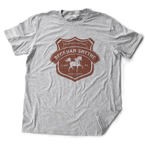 Athletic Gray fashion style, retro, vintage-inspired t-shirt with a classic graphic of a fictional Tack shop in the Hamptons, New York (Bridgehampton). From the stylish brand Ruston/Bond, with a parody of Hermes style.