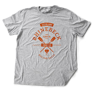 A preppy, vintage-look, retro graphic t-shirt, for a fictional Rhinebeck (New York) rowing club. It depicts two oars over waves, and the celebratory words “ruling elite” below a heart. In classic Athletic Heather Gray, by fashion brand Ruston/Bond, for a wolfsaint.net
