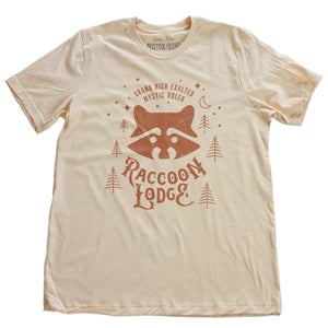 A vintage-look, retro t-shirt in Soft Cream, inspired by Ralph Kramden and Ed Norton’s club on The Honeymooners tv show. The graphic depicts the Raccoon Lodge from the tv show. By fashion brand Ruston/Bond, for wolfsaint.net