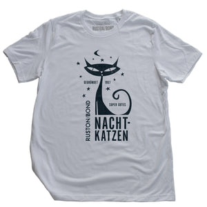 A vintage-inspired retro design t-shirt in classic White, featuring the image of a stylized cat graphic among stars, and the German text “NACHTKATZEN, Super Gutes” — translating to “Night Cats, super good” and the year 1967, with the Ruston/Bond logo beneath. From wolfsaint.net
