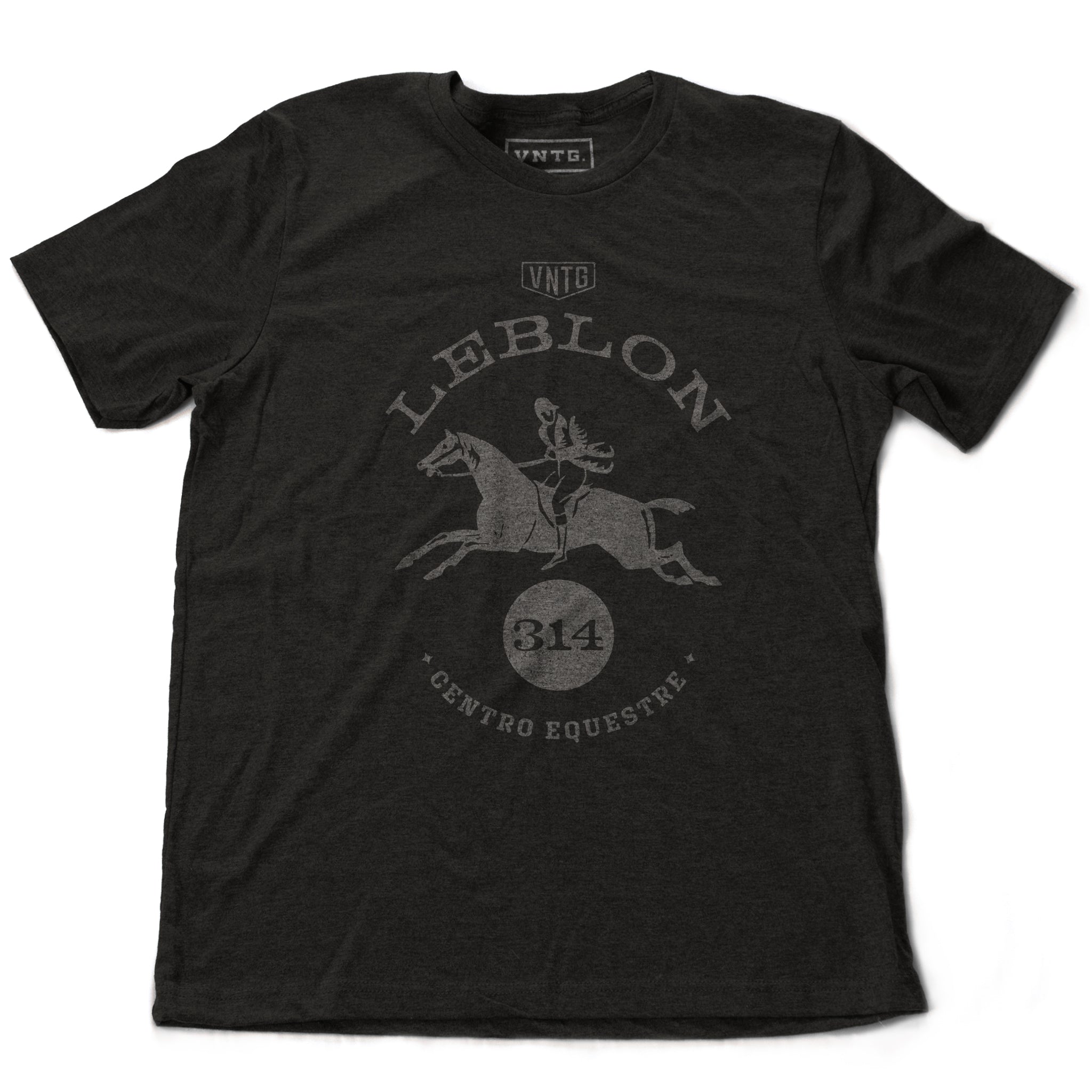 A preppy fashion retro, vintage-inspired t-shirt in Dark Gray Heather, featuring a leaping horse in dressage competition, surrounded by the words “Leblon Centro Equestre” (Leblon Equestrian Center) a fictitious horse training and competition facility in Rio de Janeiro, Brazil. By fashion brand VNTG., for wolfsaint.net