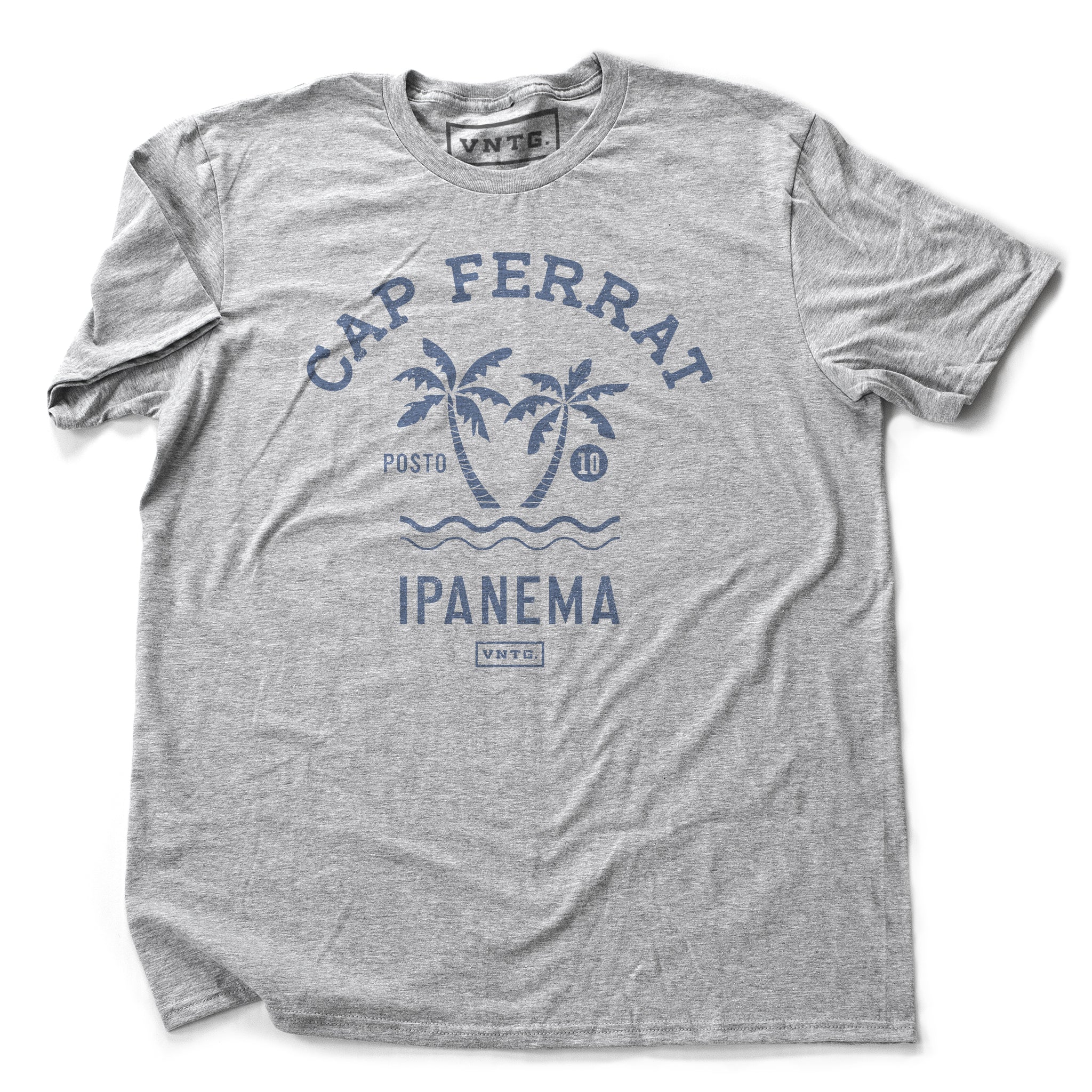 Heather gray fashion t-shirt featuring a stylish retro, vintage-inspired graphic of two palm trees against the waves, and the words Cap Ferrat, Ipanema, a popular beach spot in Rio de Janeiro, Brazil. From wolfsaint.net