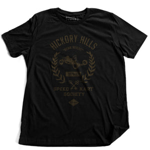 A ‘vintage fiction,’ retro t-shirt in Black, picturing a go-kart, promoting a small town racing league from 1975-1982 in Hockessin, Delaware. Inspired by the films of Wes Anderson. By fashion brand VNTG., from wolfsaint.net
