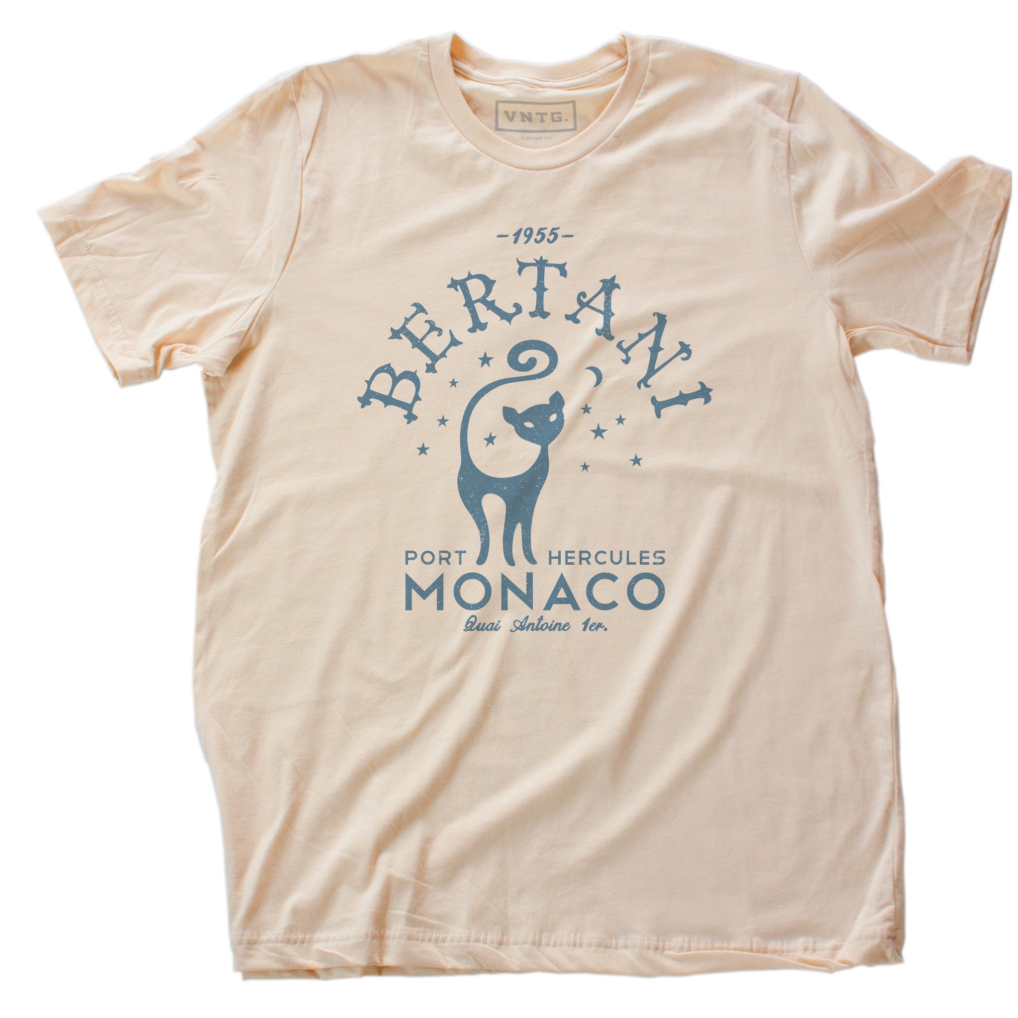 A vintage-look, retro t-shirt that was inspired by the Alfred Hitchcock film To Catch a Thief, and is a tribute to the restaurant Bertani owned by the friend of Cary Grant’s character in the film. It features old worlds typography around the image of a cat, meant to symbolize ‘John Robie The Cat’—the infamous cat burglar portrayed by Grant and loved by Grace Kelly. This shirt is elegant in Soft Cream, by fashion brand VNTG., from wolfsaint.net