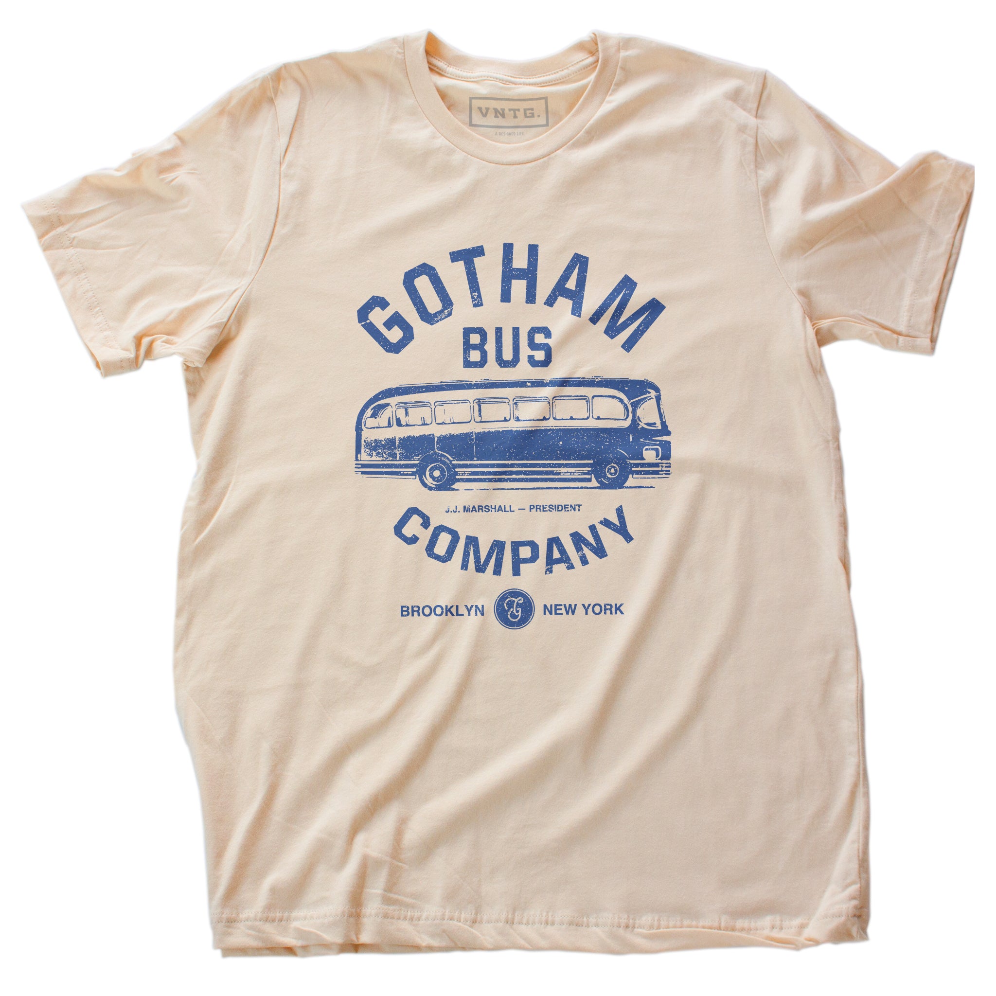 A retro t-shirt in Soft Cream, inspired by The Honeymooners, a 1950s Classic tv show featuring Jackie Gleason as Ralph Kramden. This shirt is a fictional promotion of the show’s Gotham Bus Company and shows a graphic of an old bus. By fashion brand VNTG, available from wolfsaint.net
