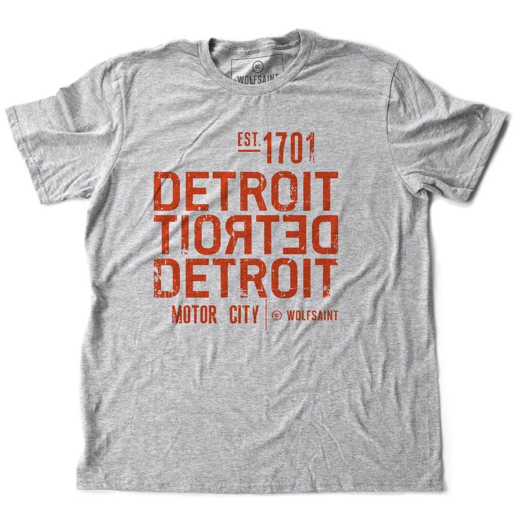 A strong graphic retro heather gray t-shirt with the word DETROIT — motor city — in bold typography, forward and backward, from Wolfsaint.net