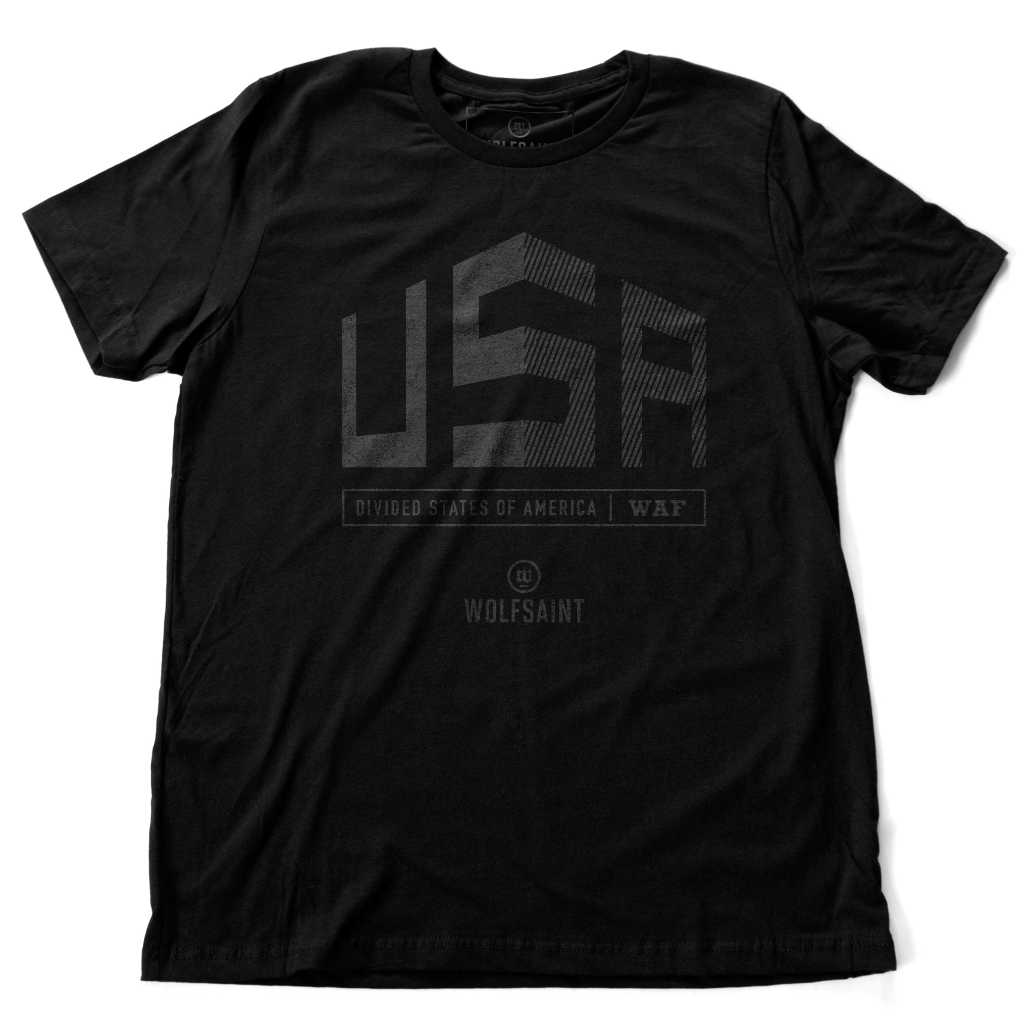 A graphic t-shirt with a divided large “USA” above the text “divided states of America” and the WOLFSAINT gothic logo. From wolfsaint.net