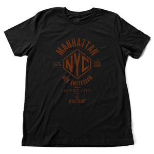 A vintage-inspired retro designed fashion-shirt in classic Black, featuring an “NYC” graphic surrounded by the words “Manhattan” and “New Amsterdam / Empire City” and the year of its founding, 1626, along with the Latin words Caput Mundi, meaning Capital of the World. From wolfsaint.net