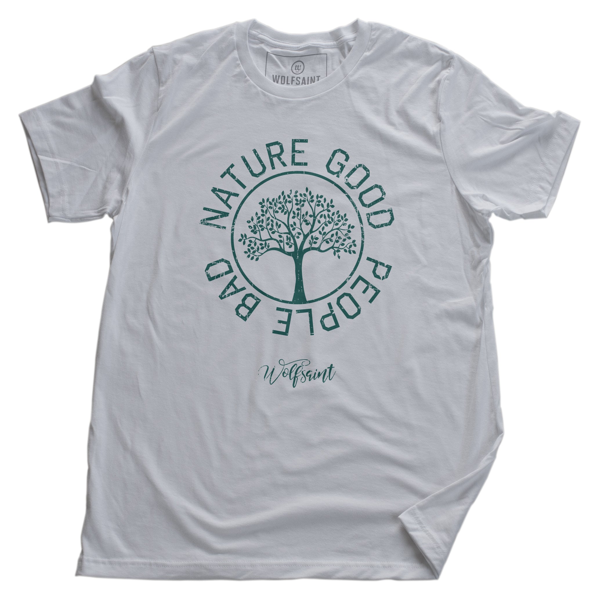 A fashionable vintage-inspired, retro t-shirt in White, featuring a graphic of a thriving tree in a circle, surrounded by the sarcastic text: “NATURE GOOD, PEOPLE BAD” with the Wolfsaint brand script logo beneath. From wolfsaint.net