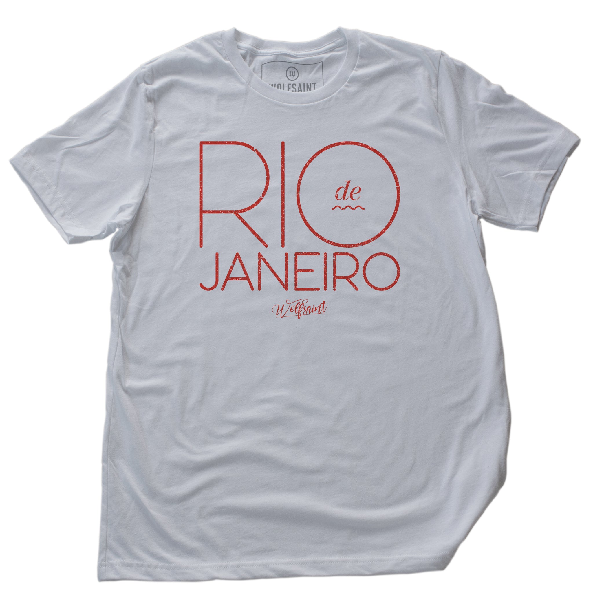 An elegant, retro design fashion t-shirt with RIO DE JANEIRO in large orange typography in a thin font on White cotton. The Wolfsaint script logo is below. From Wolfsaint.net 