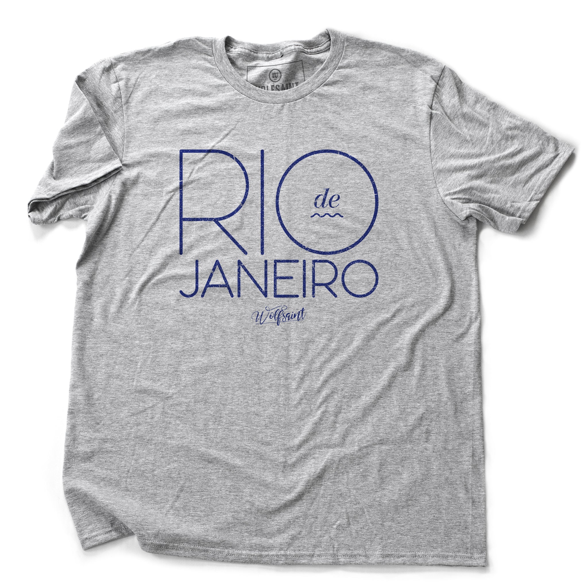 An elegant, retro design fashion t-shirt with RIO DE JANEIRO in large blue/purple typography in a thin font on Athletic Gray Heather. The Wolfsaint script logo is below. From Wolfsaint.net 