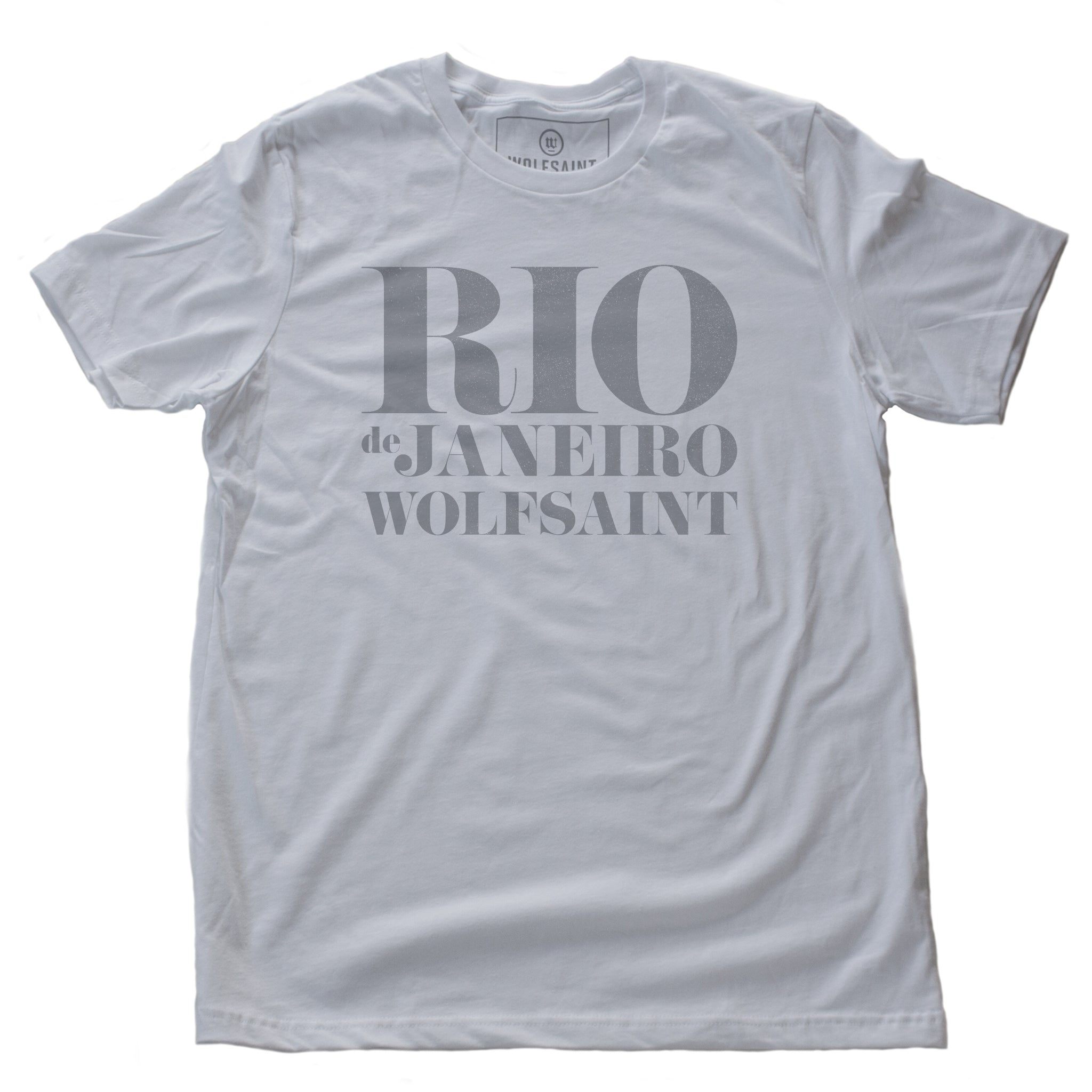 A retro graphic t-shirt in classic White, with “RIO” large, above “de Janeiro” and “Wolfsaint” in a bold, fashion-forward font. From Wolfsaint.net