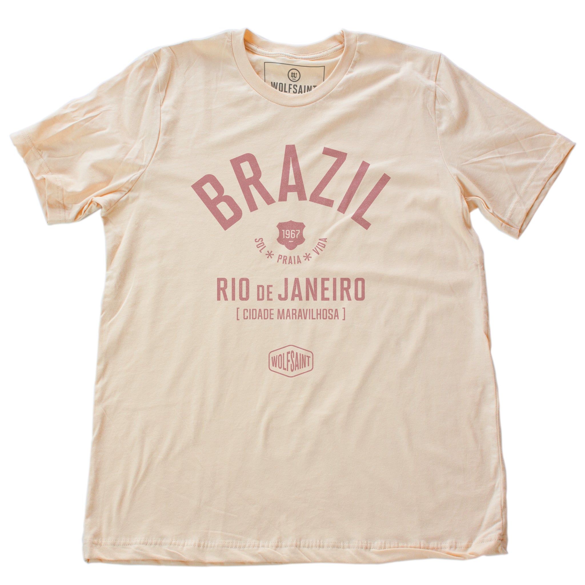 Soft Cream retro t-shirt with classic typography and graphic of BRAZIL (Brasil) and Rio de Janeiro, "Cidade Maravilhosa" (The Marvelous City) by brand Wolfsaint, with the date 1967, and sun, beach, life in Portuguese (Sol Praia Vida). From wolfsaint.net