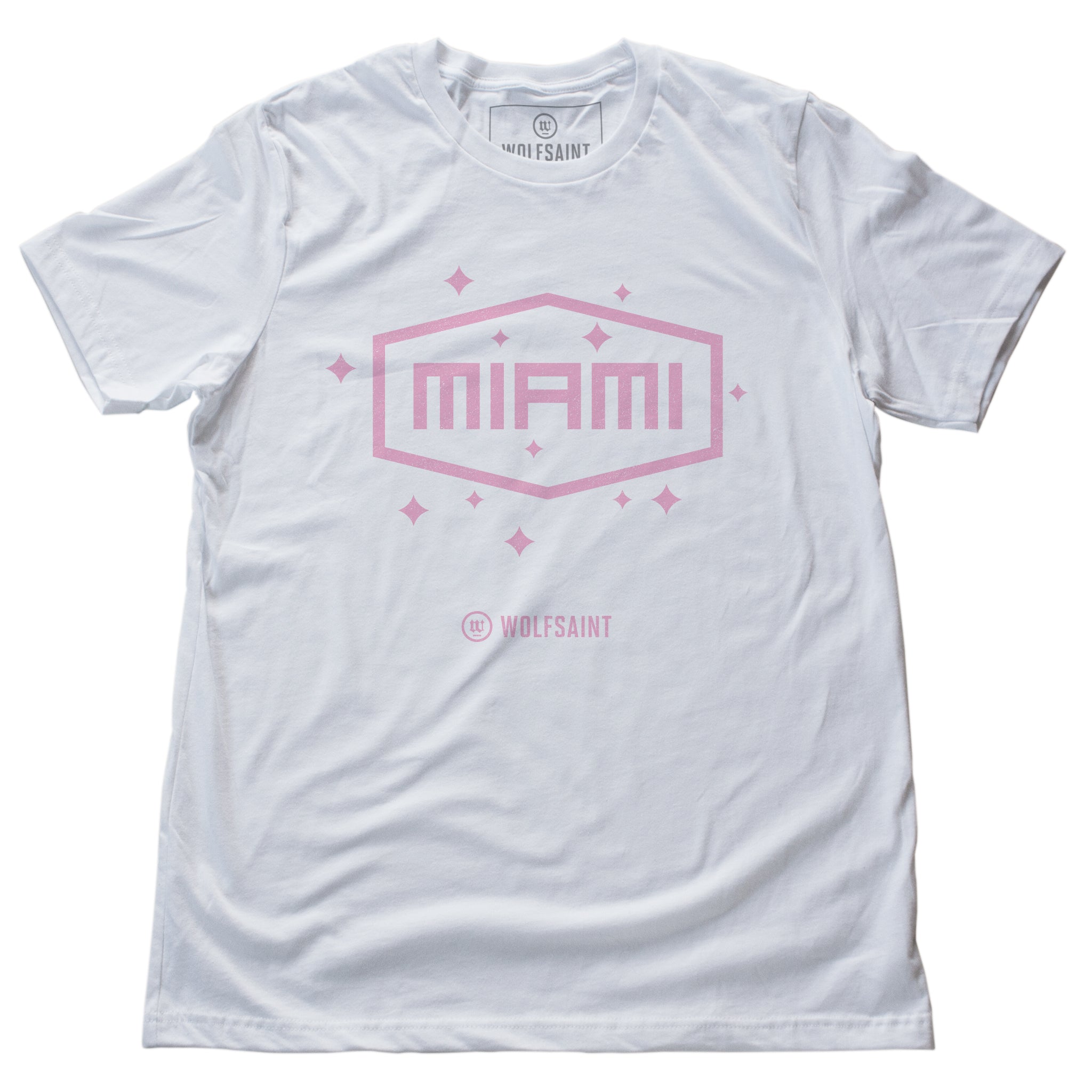 A vintage-inspired, retro fashion t-shirt in clean White, with a simple pale pink “MIAMI” graphic in a field of stars. From wolfsaint.net