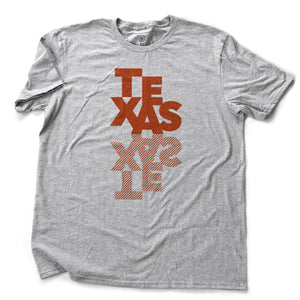 A fashionable graphic t-shirt featuring a custom designs typographic treatment of the word “TEXAS” and its inverted cross hatched mirror. By fashion brand WOLFSAINT, from Wolfsaint.net
