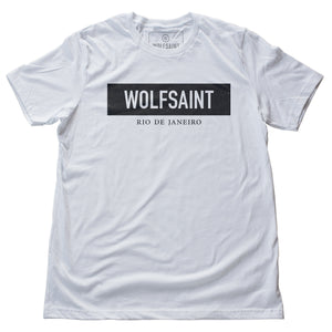 A simple fashion-branded white t-shirt with the WOLFSAINT gothic logo in a black rectangle, and “Rio de Janeiro” in smaller type below. From Wolfsaint.net
