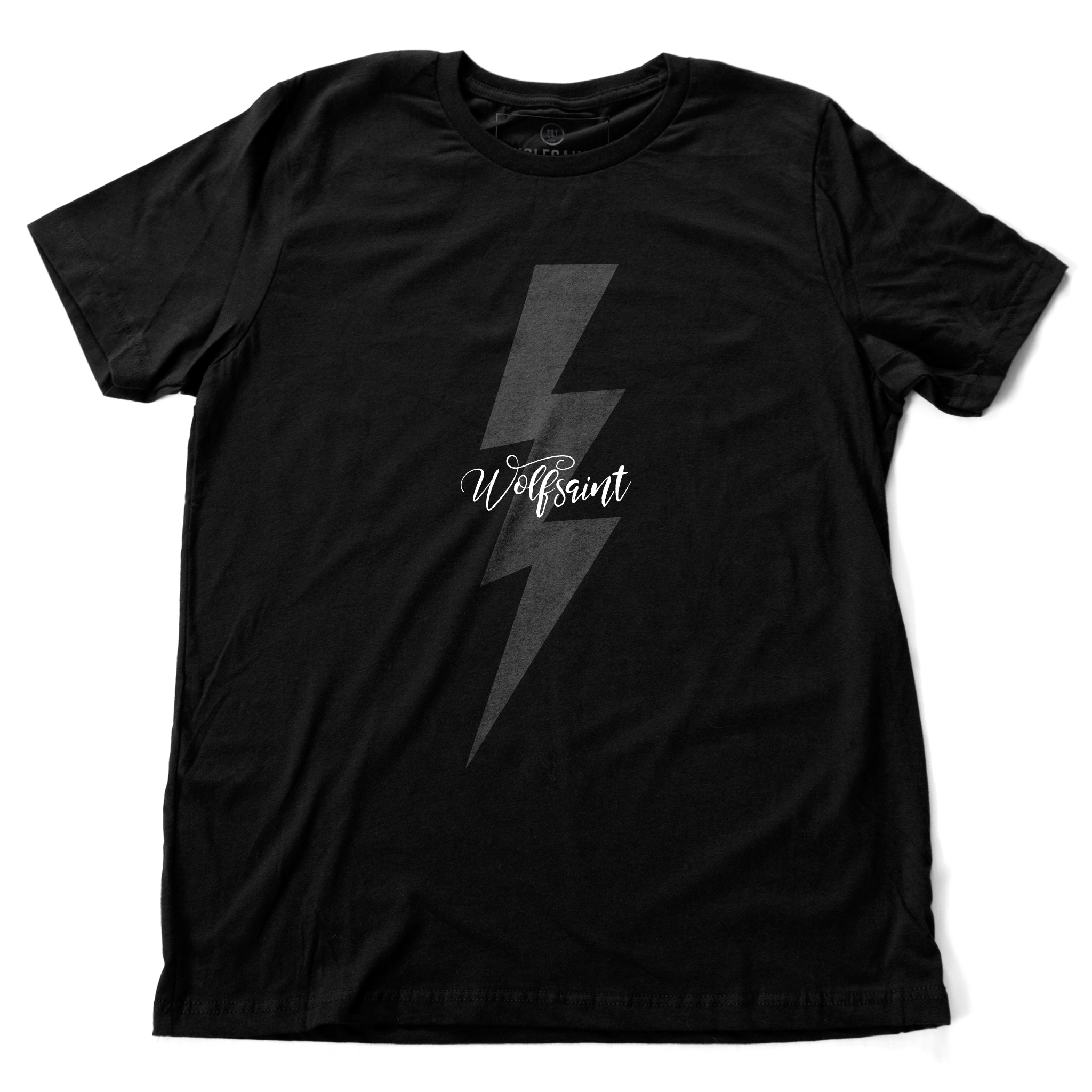 A classic fashion t-shirt in black, with retro lightning bolt graphic and the Wolfsaint script logo on the front, and bold typography “Live fast. Live long” on the back. From wolfsaint.net
