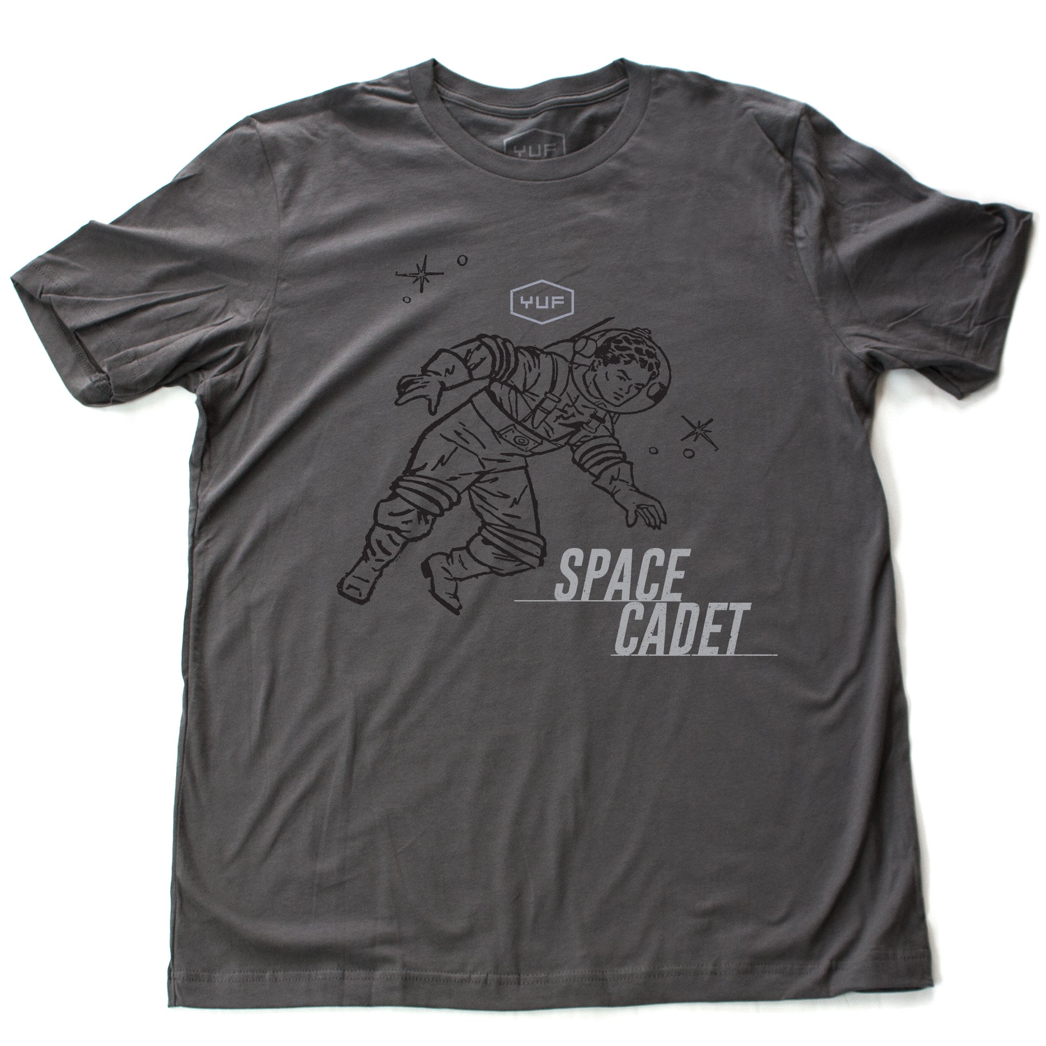 A sarcastic, self-deprecating vintage-inspired, retro design fashion t-shirt in Asphalt Gray, featuring an astronaut or spaceman, amid stars, and the word “SPACE CADET.” By fashion brand YUF, for wolfsaint.net 