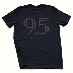 Navy blue sarcastic, ironic t-shirt with mocking, self-deprecating large "9.5" graphic, referring to 'almost a perfect 10' in the style of a sports jersey
