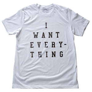 A simple, elegant, sarcastic retro graphic t-shirt in white, with bold typography that reads “I WANT EVERYTHING.” By fashion brand YUF, from wolfsaint.net