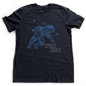 A sarcastic, self-deprecating vintage-inspired, retro design fashion t-shirt in Classic Navy Blue, featuring an astronaut or spaceman, amid stars, and the word “SPACE CADET.” By fashion brand YUF, for wolfsaint.net 