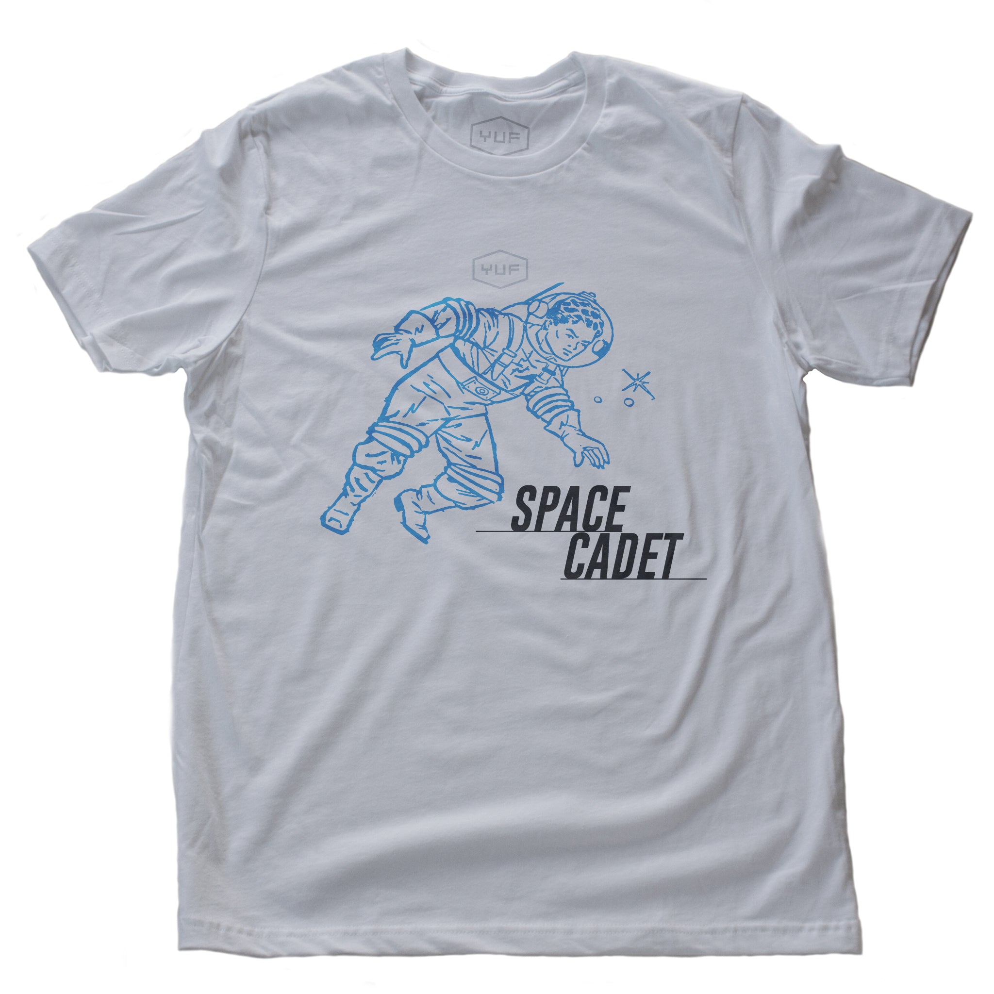 A sarcastic, self-deprecating vintage-inspired, retro design fashion t-shirt, featuring an astronaut or spaceman, amid stars, and the word “SPACE CADET.” By fashion brand YUF, for wolfsaint.net 