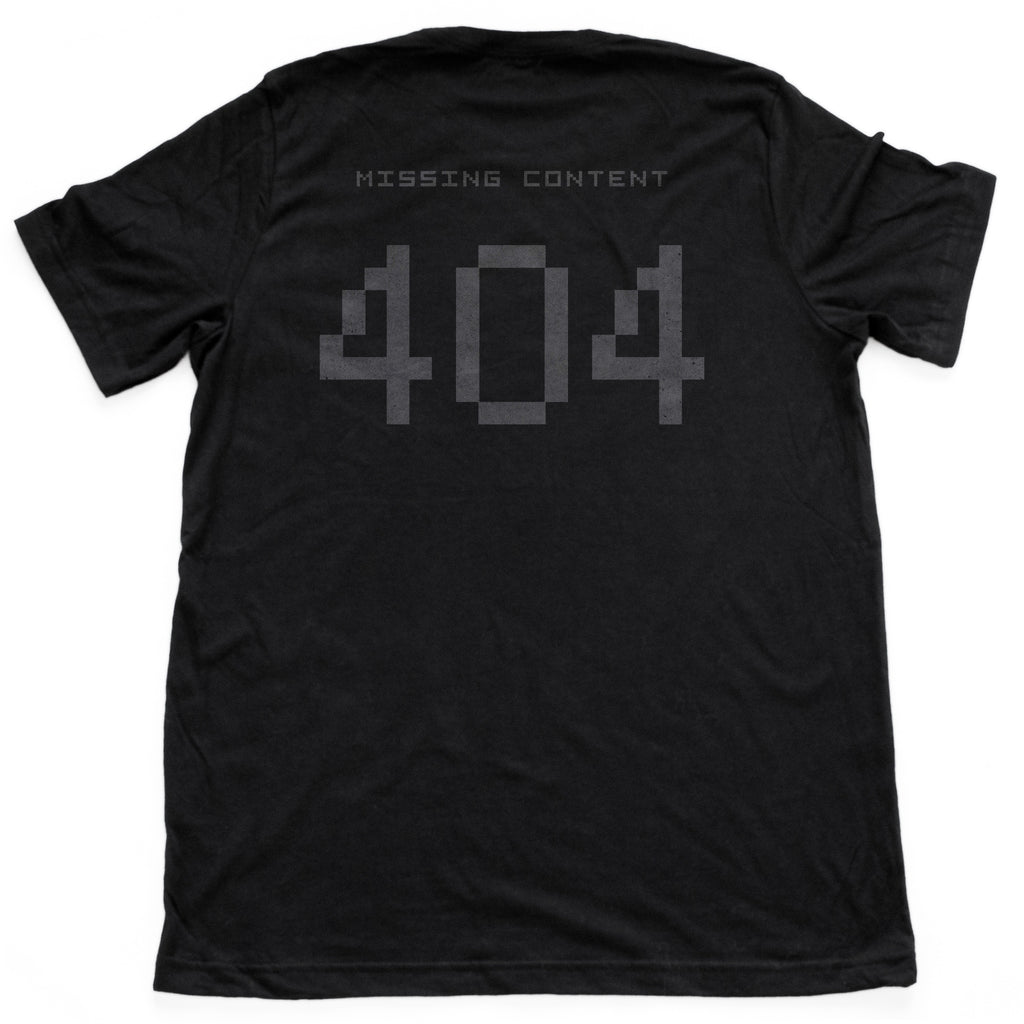 A graphic t-shirt with a sarcastic meme theme, showing the digital “404 missing content” error message common to internet searches. From Wolfsaint.net