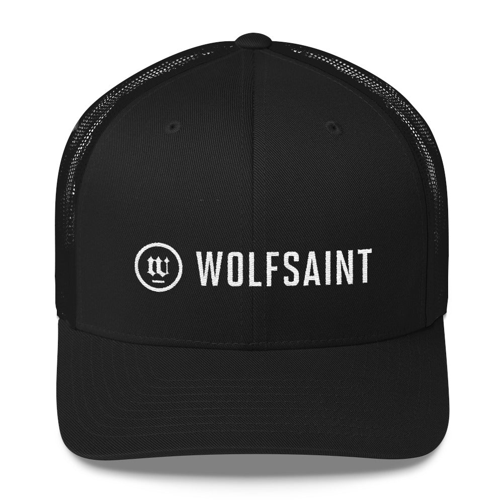 A black on black classic retro truckers cap with the WOLFSAINT gothic logo and circle crest in white on the front panels. From Wolfsaint.net