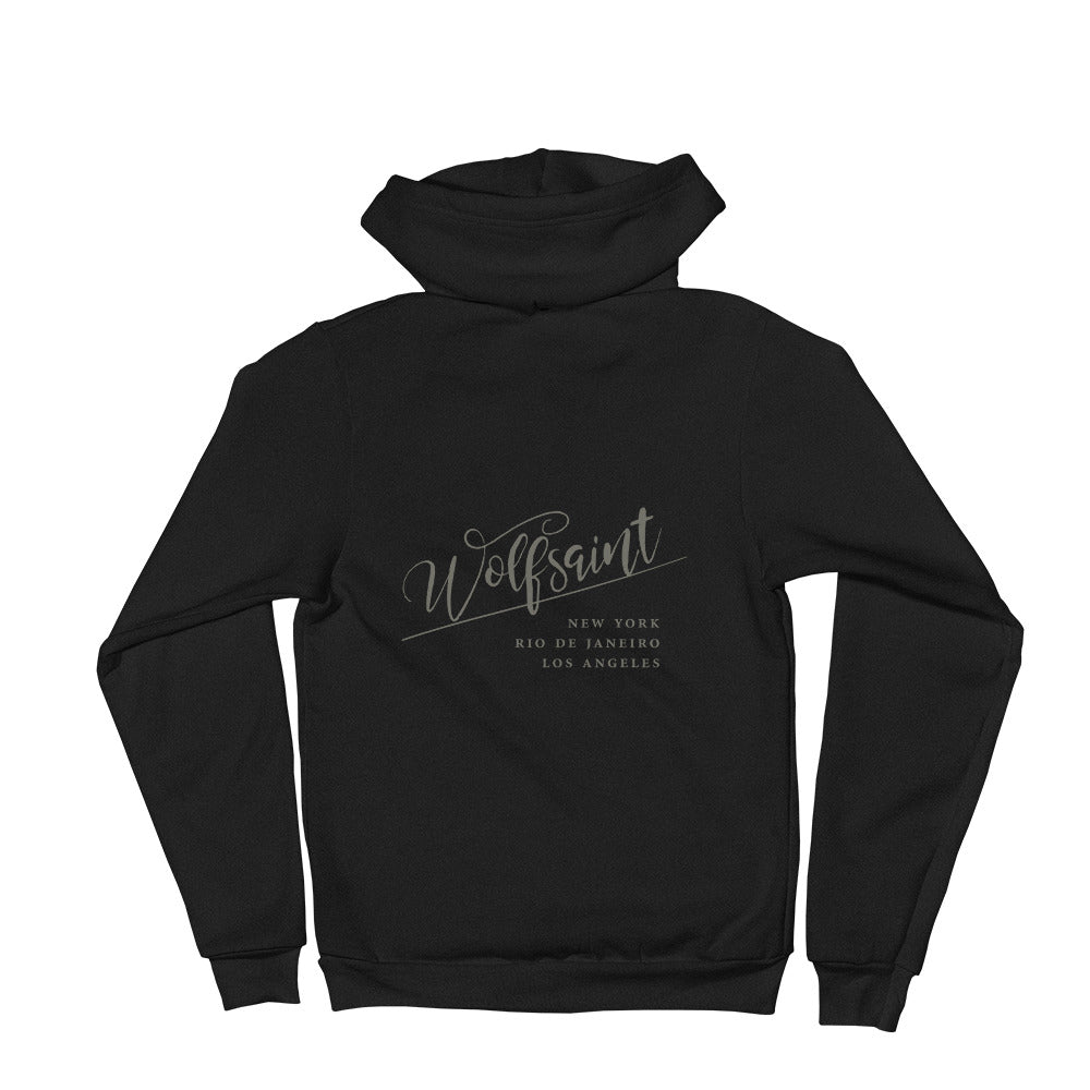 A trendy hoodie sweatshirt in Black, with the elegant Wolfsaint script logo in gray, and the Wolfsaint cities listed below: “New York, Rio de Janeiro, Los Angeles”. From Wolfsaint.net