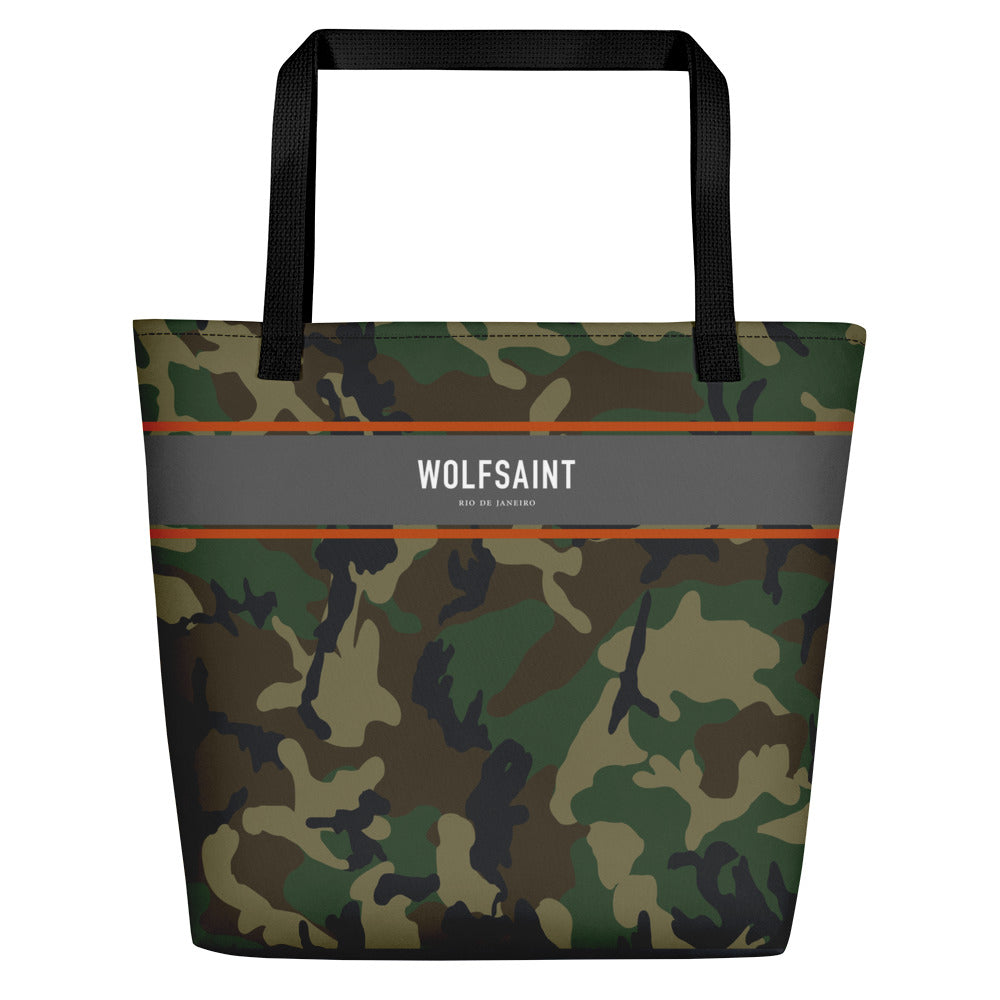 A large sized stylish unisex beach or city tote bag, with an all-over camouflage / camo print, and a thick gray band at the top, with the WOLFSAINT gothic logo and “Rio de Janeiro” in small print. From Wolfsaint.net