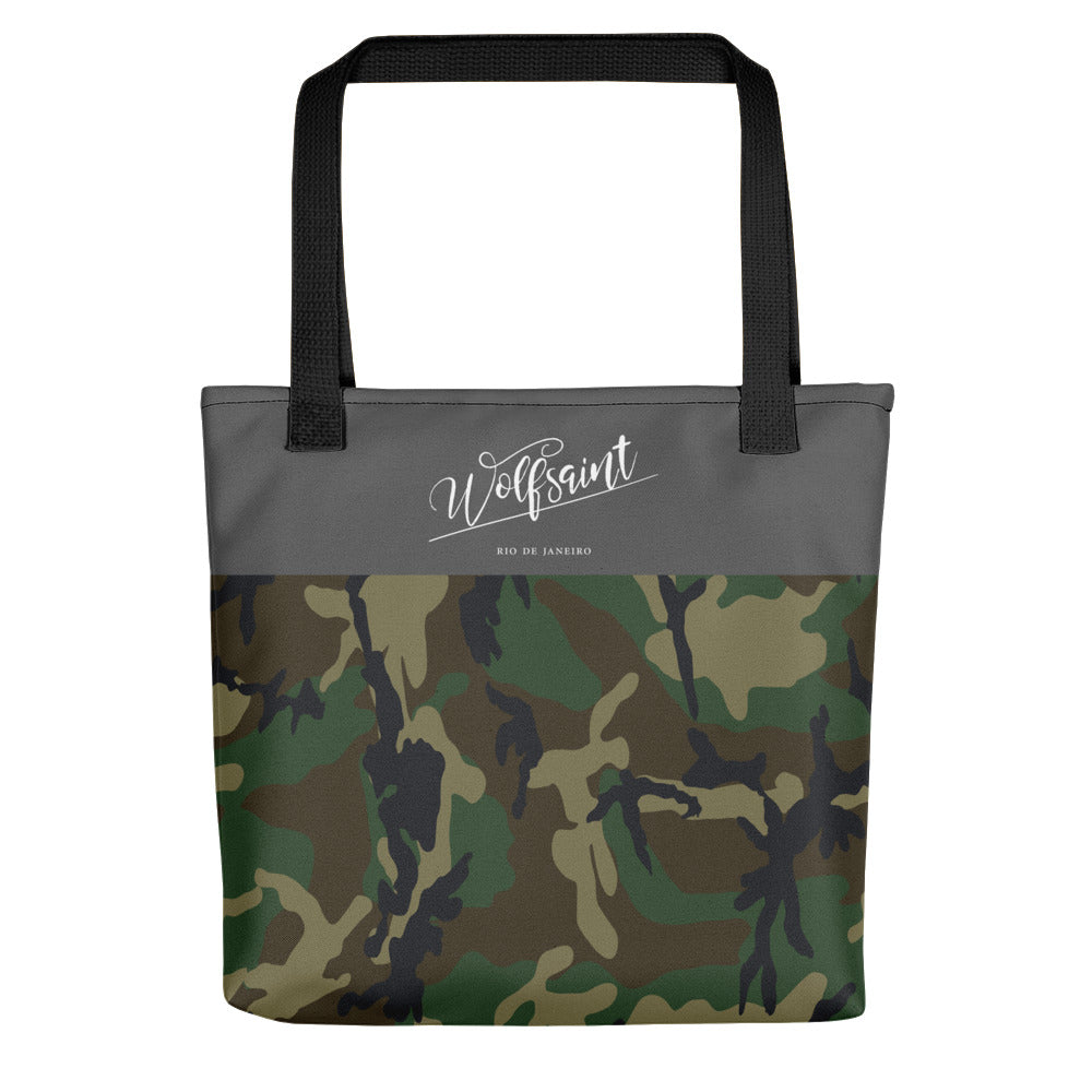 A medium sized stylish unisex beach or city tote bag, with an all-over camouflage / camo print, and a thick gray band at the top, with the Wolfsaint script logo and “Rio de Janeiro” in small print. From Wolfsaint.net